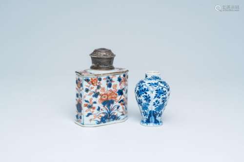 A Chinese blue and white vase and an Imari style tea caddy w...