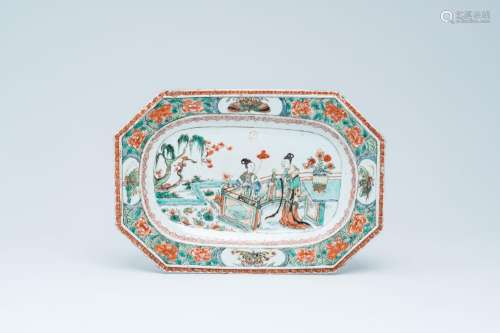 An octagonal Chinese famille verte plate with ladies on a te...