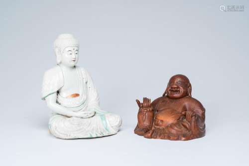 A Japanese Satsuma figure of a seated Buddha, Meiji, and a s...