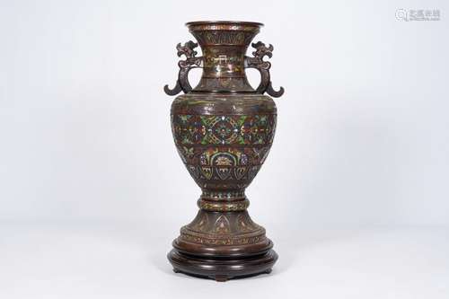 A large Japanese champleve vase with mountain landscapes and...