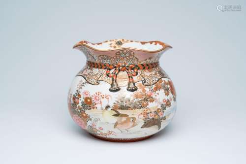 A large 'knotted' Japanese Kutani vase with quails in a land...
