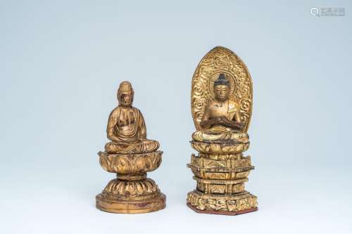 Two Japanese gilt-lacquered wooden Buddhas seated on a lotus...