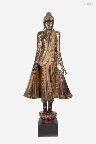 A tall Thai inlaid gilt wood figure of a standing Buddha, 20...