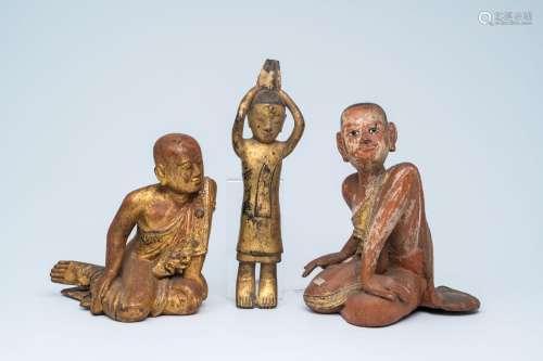 Three partly inlaid gilt wood figures of servant figures, Th...