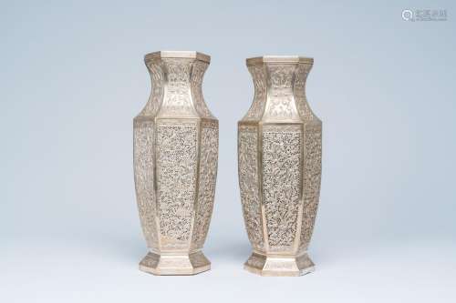 A pair of hexagonal Vietnamese openworked silver plated vase...