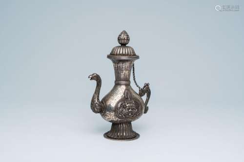A Tibetan silver-plated ewer with a phoenix-shaped spout, 19...