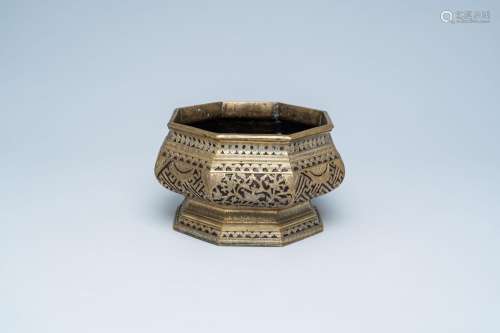 An octagonal Indonesian brass sirih bowl with floral design ...