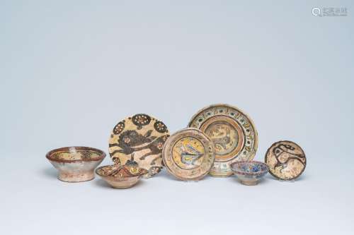 Three polychrome Islamic and Persian dishes and four bowls w...