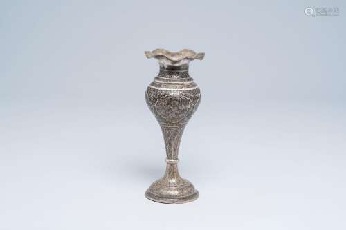 A Persian silver Shiraz vase with animated medallions, flora...