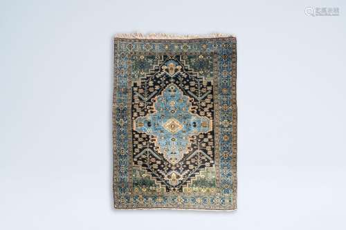 An oriental rug with geometric design, wool on cotton, 20th ...