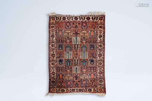 A Persian Bakhtiari rug with floral design, wool on cotton, ...