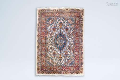 A large Iranian Kashmir rug with antiquities and birds among...