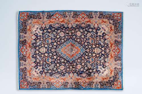 A large Iranian Kashmir rug with antiquities, animals and fl...