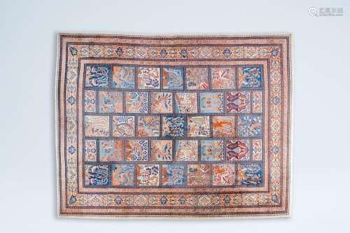 A Persian Bakhtiari rug with animals and floral design, wool...