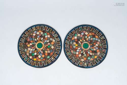 A pair of round Italian pietra dura table tops, 20th C.<br /...
