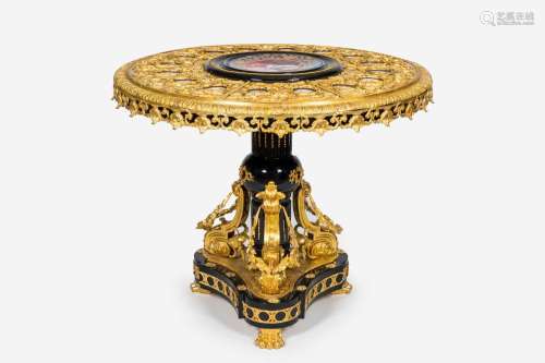 An impressive tripod Sevres style gilt mounted table with re...