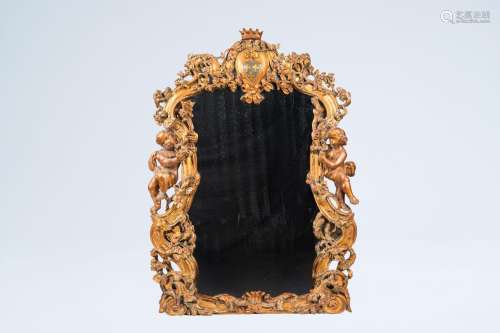 An impressive French giltwood mirror with the royal French c...