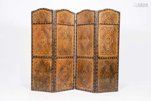 A Flemish four-panel gold leather folding screen, probably M...