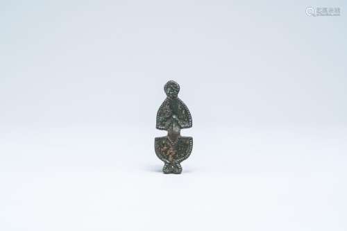 A Merovingian bronze fibula with traces of gilt design, 5th/...