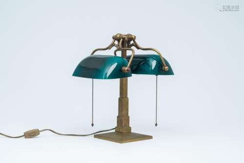 An English brass and glass two-light banker's lamp, Christop...