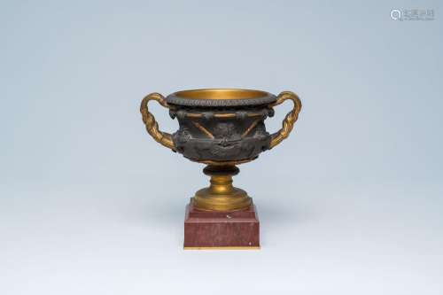 A gilt and patinated bronze Medici coupe with grape vines an...