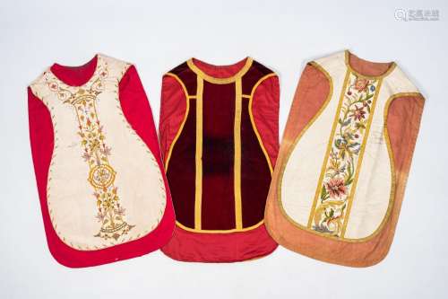 Three various Gothic Revival silk and velor chasubles with e...