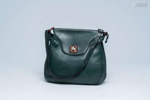 A Belgian green leather Delvaux shoulder bag with wood detai...