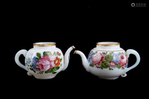 Pair of small glass teapots