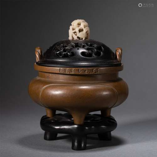 A BRONZE LIDDED CENSER