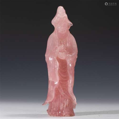 A CARVED PINK ROCK CRYSTAL STANDING GUANYIN