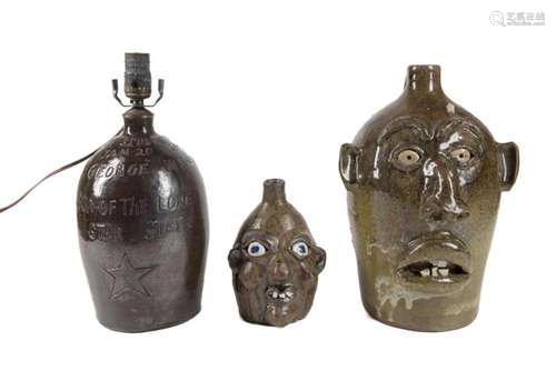 3PCS STONEWARE FACE JUGS AND AN INSCRIBED LAMP