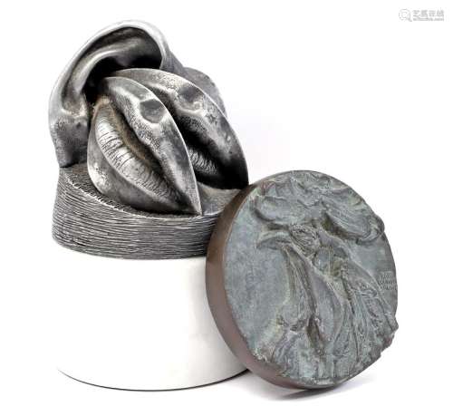 Bronze medal and metal sculpture