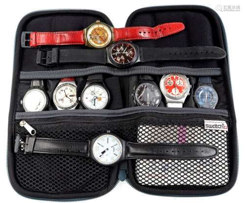 9 Swatch watches in various designs