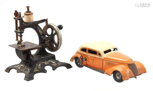 Tin car and iron sewing machine