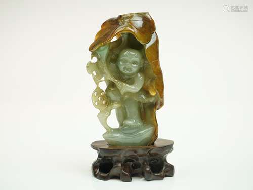 Green and Yellow Jadeite Carving of Child with Lotus