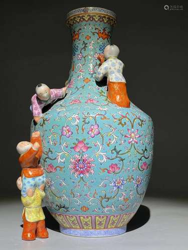 A turquoise-ground famille rose ‘five boys’ vase.