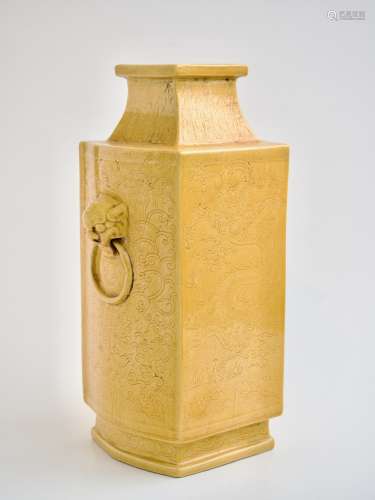 A Chinese carved yellow glazed 'Dragon' fanghu vase, Qianlon...