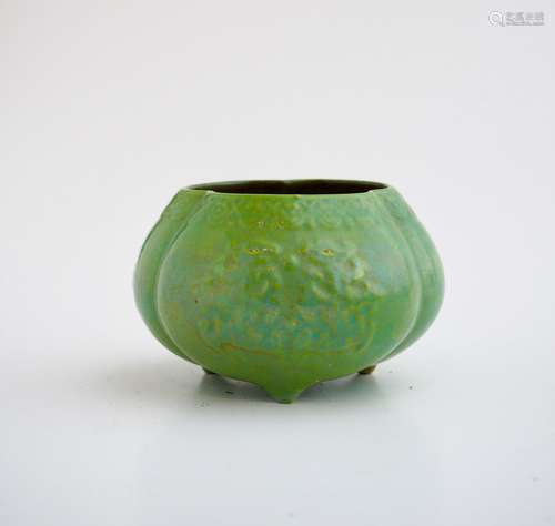 A Chinese moulded lime-green glazed 'Twin Dragons' pumpkin-s...