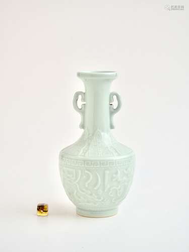 A fine Chinese carved and moulded celadon glazed 'Archaistic...