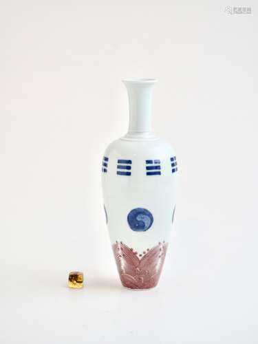 A Chinese copper red and underglaze blue 'Bagua Trigram' san...