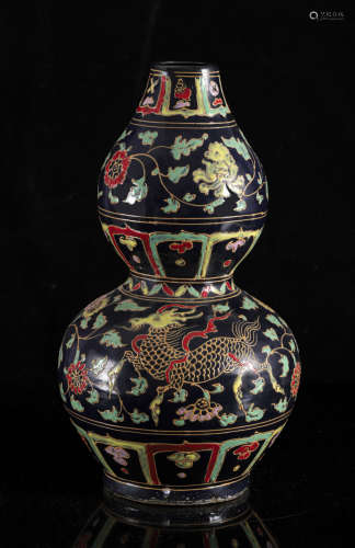 A Chinese famille verte on black ground 'Qilin' double-gourd...