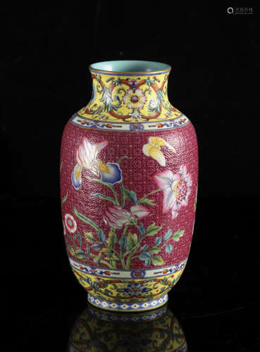 A Chinese famille rose ruby ground sgraffito 'Butterflies an...