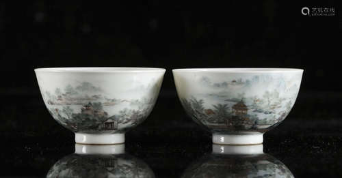 A pair of Chinese yangcai 'River landscape' tea bowls, Qianl...