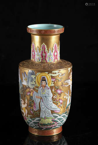 A Chinese famille rose on gilt ground 'Guanyin' rouleau vase...