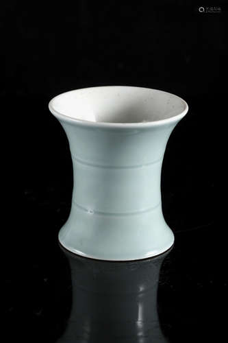 A Chinese celadon glazed beaker vase, Qianlong mark, H cm