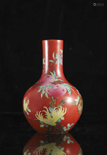 A Chinese famille rose on coral-red ground 'Peaches' bottle ...