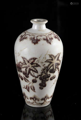 A Chinese copper-red 'Lily' meiping vase, H 22,5 cm