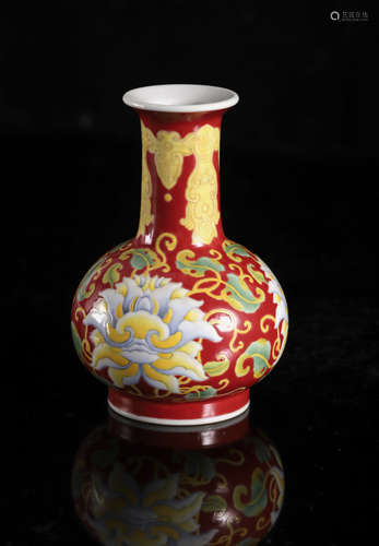 A Chinese yellow and green enamel on red ground 'Lotus scrol...