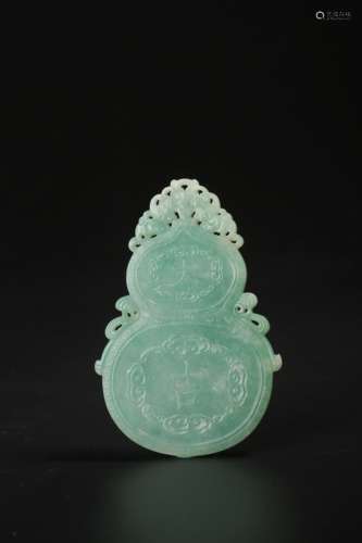 A Chinese carved emerald jade double gourd pendant