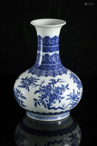 A Chinese blue and white 'Sanduo' bottle vase, Qianlong mark...